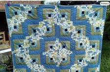 Patchwork lap quilt, curving