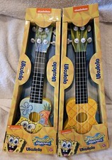 SPONGEBOB SquarePants PAIR OF UKULELES Nickelodeon. TEAL & YELLOW,  PINEAPPLE.