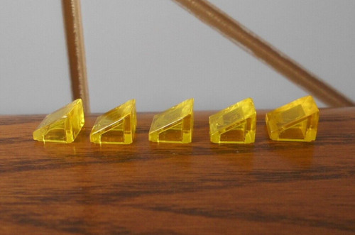 Trans yellow 1x1 slope - yellow,