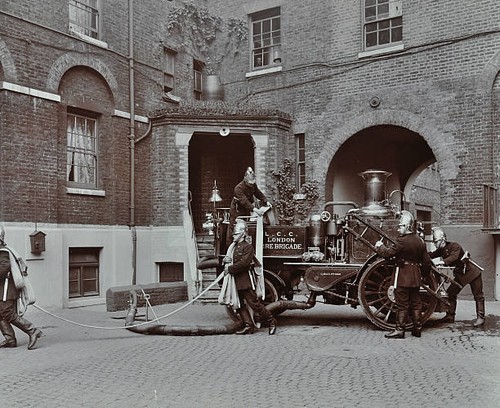 Firemen demonstrating motor