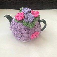 HAND KNITTED BASKET WEAVE TEA COSY FLOWERS/ BUTTERFLY/   SMALL POT  Lilac