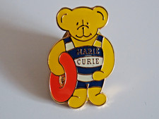 Marie Curie pin badge swimming
