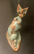 Yare Vintage Pottery Dragon sitting in a shell