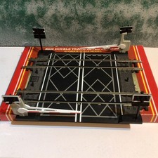 Double Hornby level crossing 00 gauge with booms and hazard lights.Boxed.