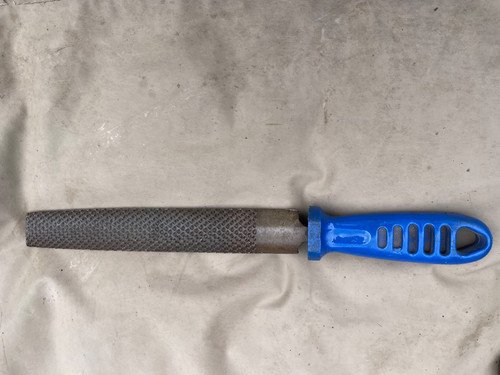 Wood rasp with blue plastic