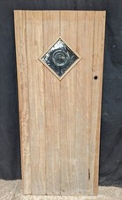 A RECLAIMED HARDWOOD PLANK INTERNAL DOOR WITH BULLSEYE GLASS Ref DI0934