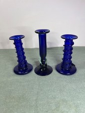 Three  vintage glass candlestick holders in cobalt blue. VGC