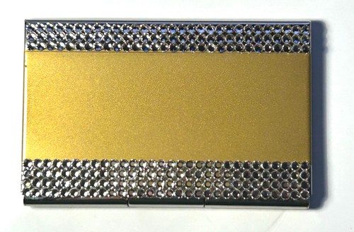 Gold metal card holder with - card,
