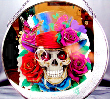 Etched and coloured image on