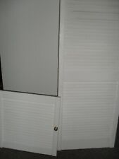 one white used louvered door Good condition  smaller door only see details