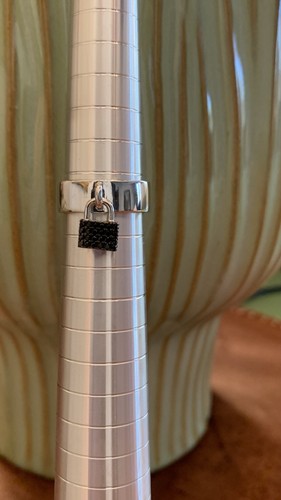 Black spinel lock charm detail - black,