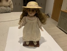 Porcelain Doll On Stand