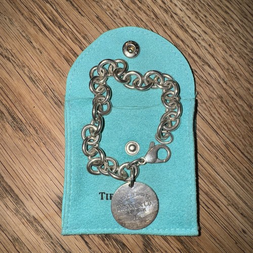 Please return tiffany co - to, &