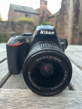 Nikon D3500 24.2MP DSLR Camera with 18-55mm Lens Kit + Water Resistant Bag