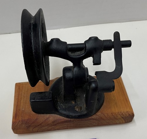 Vintage cast iron bobbin - cast,