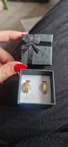 Gold and silver hoop earrings - and,