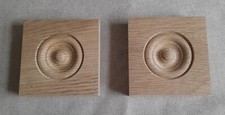 A pair of oak bullseye architrave corner frame blocks 9cm x 9cm x 2cm deep