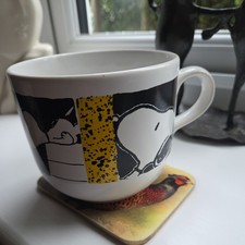 Vintage Peanuts Snoopy Kilncraft Mug Large Size yellow and black with snoopy on.