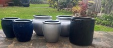         6  fibreglass planters  medium to large suitable for the garden j