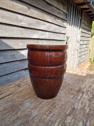 Tall round brown ceramic - tall,