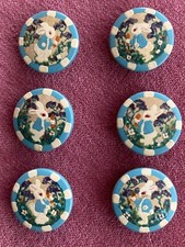 6 Rare antique hand painted peter rabbit wooden buttons.  collectors item.