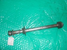 SUZUKI RG125 REAR ? WHEEL SPINDLE C/W SPACERS ETC