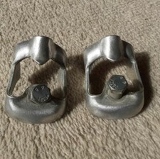 Two 'clown' climbing/caving bolt hangars