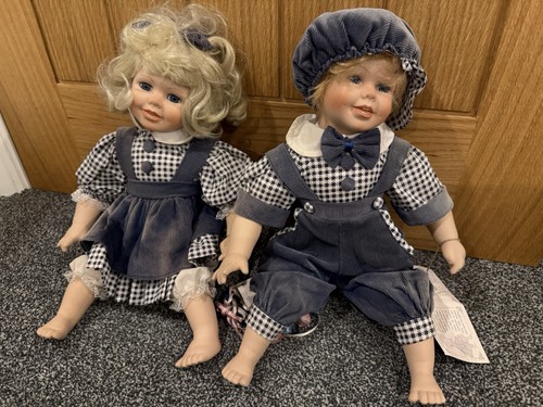 Porcelain dolls him and - him, her