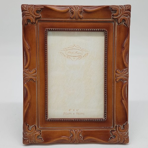 Ornate brown resin photo - resin,
