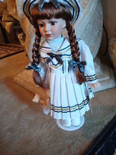 Porcelain dolk by - 18, in