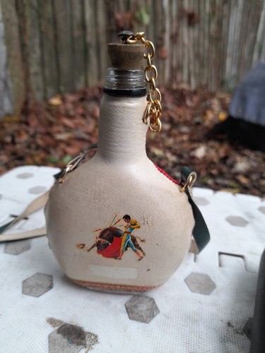 Leather covered bottle - leather,
