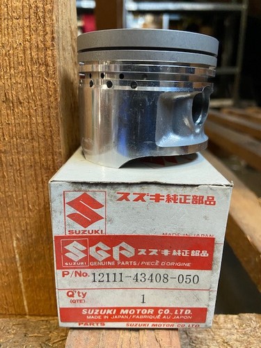 New genuine suzuki piston - new,
