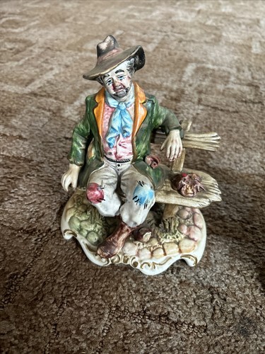 Capodimonte figurine tramp - tramp, on