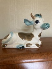 Vintage Szeiler lying down cow