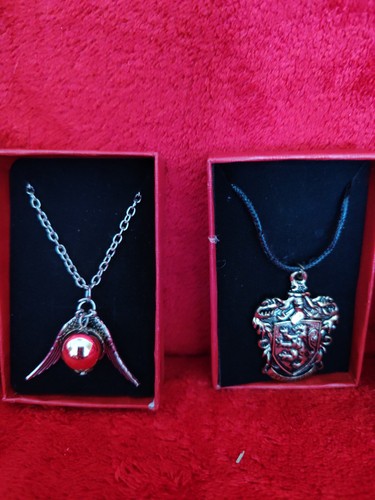 Two harry potter - necklaces, one
