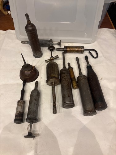 Vintage grease guns job - grease,
