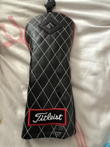 Black and red titleist fairway - and,
