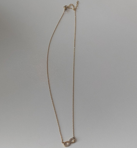 Gold tone infinity pendant - gold,