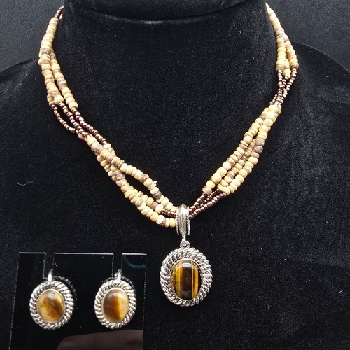 Avon 2005 tiger eye pendant - 2005,