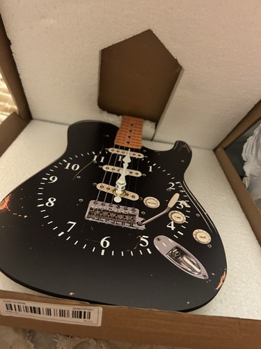 Battery operated guitar - operated, shaped