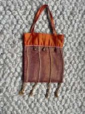 Small red/gold organza and tan silk bag from The Body Shop