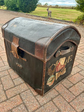 AN EARLY 20TH CENTURY LEATHER DOME TOP TRUNK, WIDTH 67 CM
