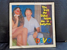 DEVO " THE DAY MY BABY GAVE ME A SURPRISE  " 7" 45  EX+ COND.IN PIC SL.