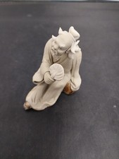 Vintage Chinese Mudman Holding