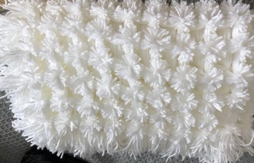 Hand made white pom - hand,