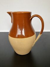 Stonewear Bi Colour Tall Tan and Sand Coloured Jug. Makers Mark on Base. H9Ins.