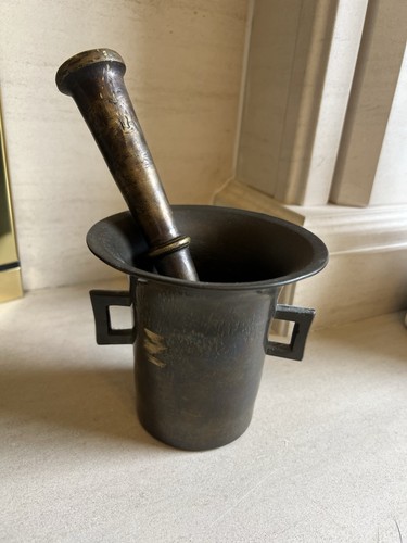 Vintage brass pestle and