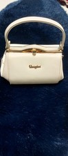 Very elegant handbag it has - very, handbag!