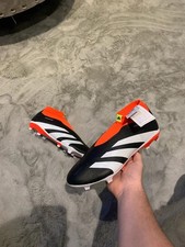 Black and orange adidas