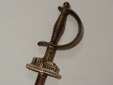 Vintage Brass sword paper